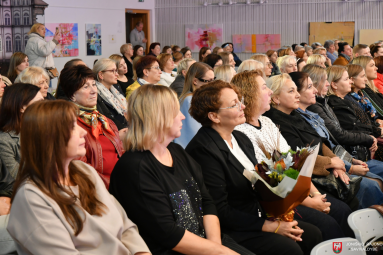 Su profesine švente pasveikinti rajono socialiniai darbuotojai